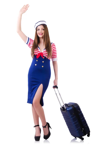 Woman travel attendant with suitcase on white — Stock Photo, Image