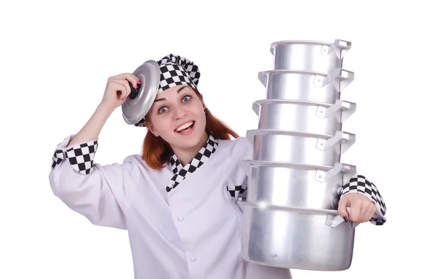 Cook with stack of pots on white — Stock Photo, Image