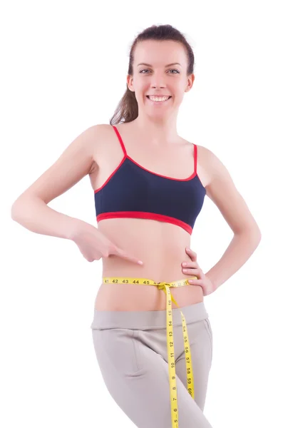 Jong meisje met centimeter in dieet concept — Stockfoto