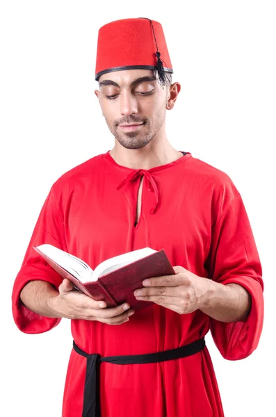 Turco jovem com livro sobre branco — Fotografia de Stock