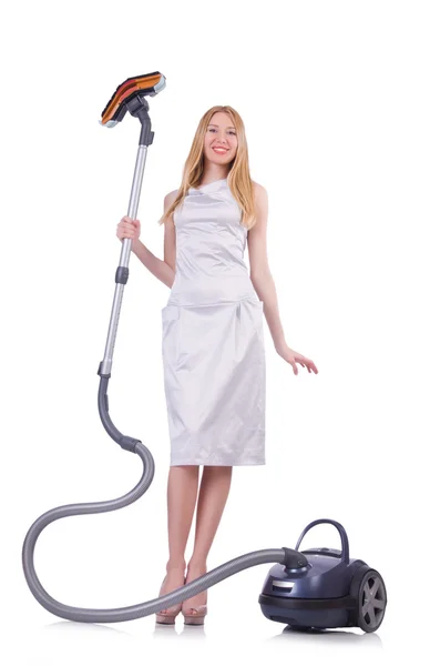 Jeune femme avec aspirateur sur blanc — Photo