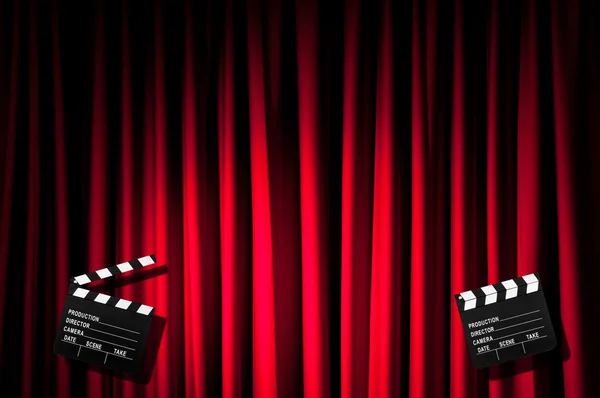 Movie clapper board against curtain — Stock Photo, Image