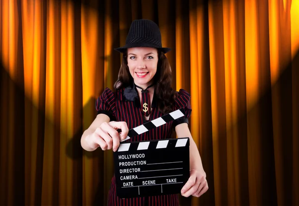 Woman gangster with movie clapper — Stock Photo, Image