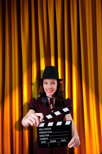 Woman gangster with movie clapper — Stock Photo, Image