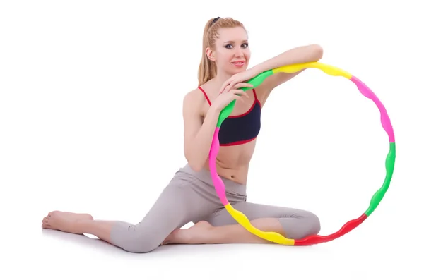 Mulher fazendo exercícios com hula hoop — Fotografia de Stock