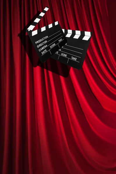 Filme clapper board contra cortina — Fotografia de Stock