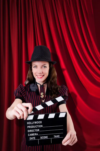 Woman gangster with movie clapper — Stock Photo, Image