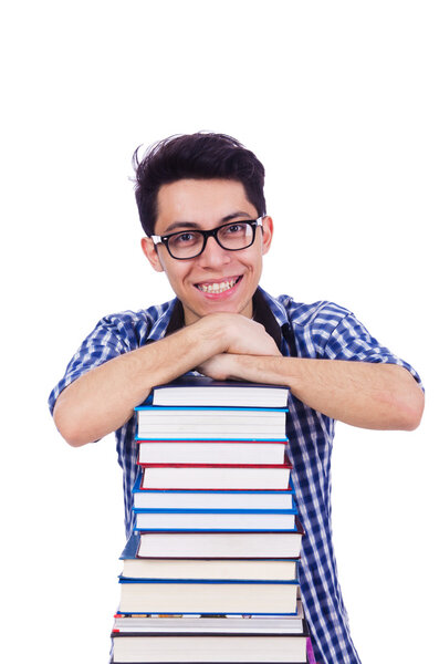 Студент с большим количеством книг на белом