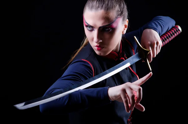 Vrouw in japans martial art concept — Stockfoto