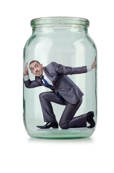 Young businessman in glass jar — Stock Photo, Image