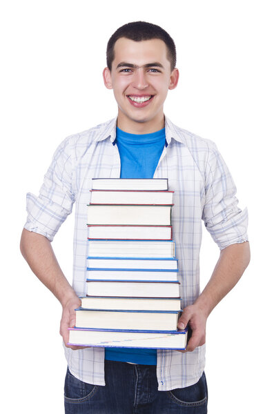 Студент с большим количеством книг на белом