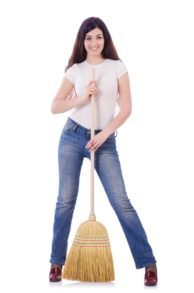 Young woman with broom isolated on white — Stock Photo, Image