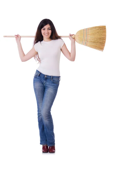 Young woman with broom isolated on white — Stock Photo, Image