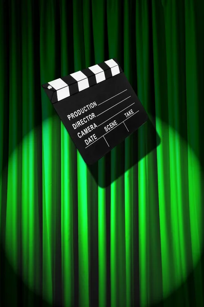 Movie clapper board against curtain — Stock Photo, Image