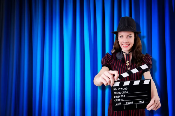 Woman gangster with movie clapper — Stock Photo, Image