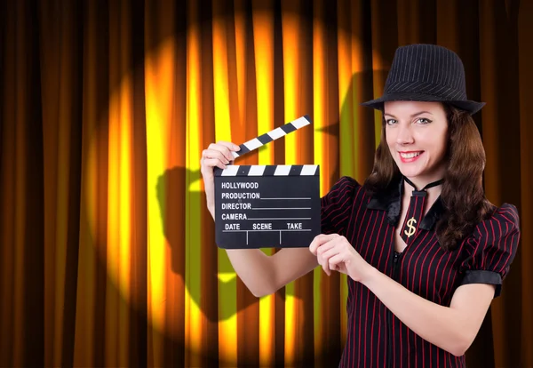 Woman gangster with movie clapper — Stock Photo, Image