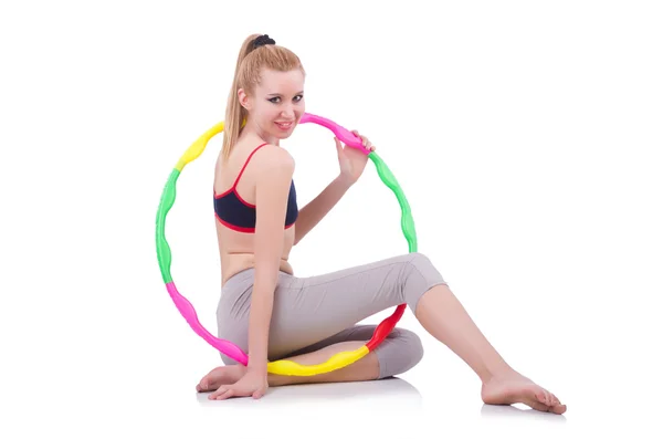 Woman doing exercises with hula hoop — Stock Photo, Image