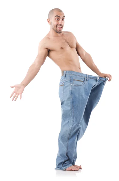 Man in dieting concept with oversized jeans — Stock Photo, Image