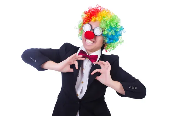 Grappige clown met toetsenbord op wit — Stockfoto