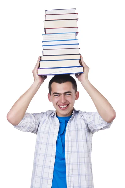 Студент с большим количеством книг на белом — стоковое фото