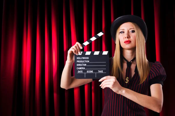 Woman gangster with movie clapper — Stock Photo, Image