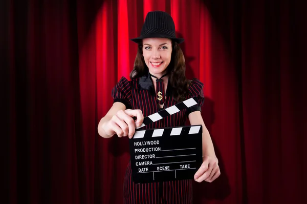 Woman gangster with movie clapper — Stock Photo, Image