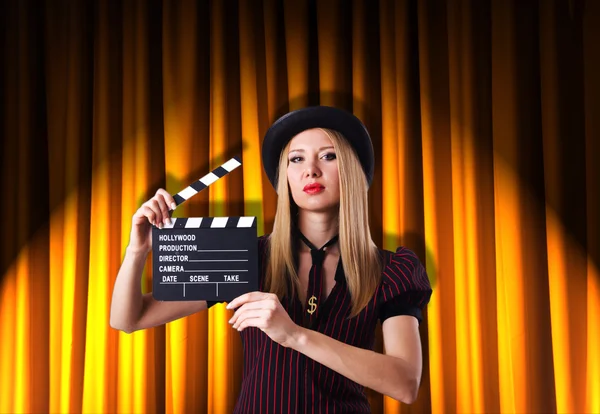 Woman gangster with movie clapper — Stock Photo, Image