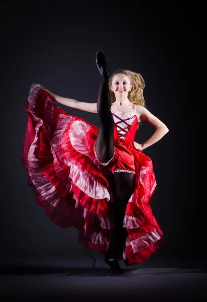 Girl in red dress dancing dance — Stock Photo, Image