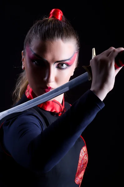 Vrouw in japans martial art concept — Stockfoto