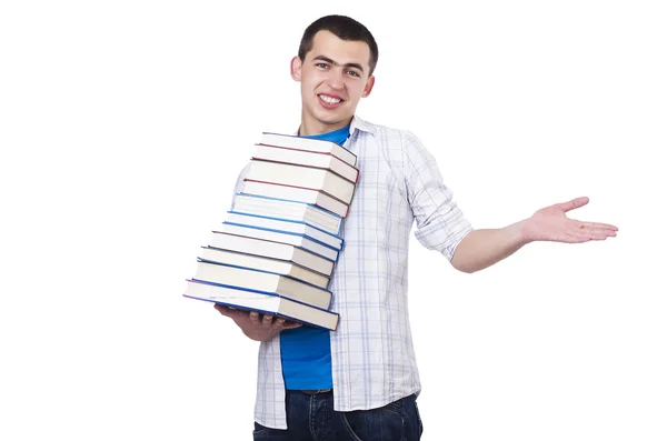 Student mit vielen Büchern auf weiß — Stockfoto