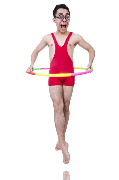 Lustiger Sportler mit Hula-Hoop-Reifen auf Weiß — Stockfoto