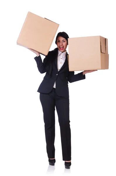 Женщина с большим количеством коробок на белом — стоковое фото