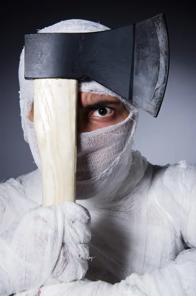 Mummy with axe in halloween concept — Stock Photo, Image