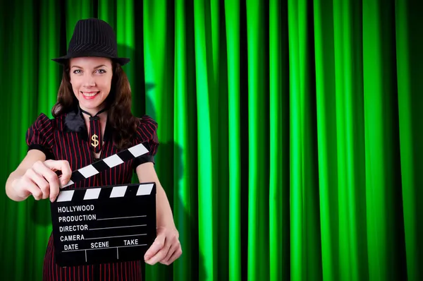 Woman gangster with movie clapper — Stock Photo, Image