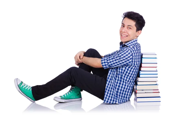 Student with lots of books on white — Stock Photo, Image