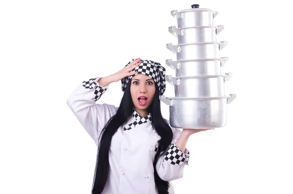 Cook with stack of pots on white — Stock Photo, Image