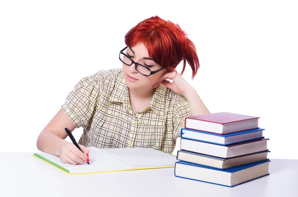 Studentin mit Büchern auf Weiß — Stockfoto