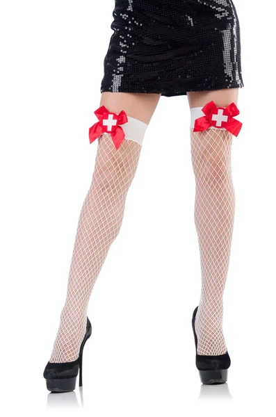 Vrouw benen met kousen op wit — Stockfoto