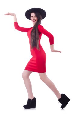 Beyaz üzerine şık kıyafetler giyen bir manken.