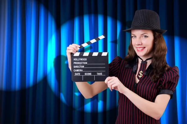 Woman gangster with movie clapper — Stock Photo, Image