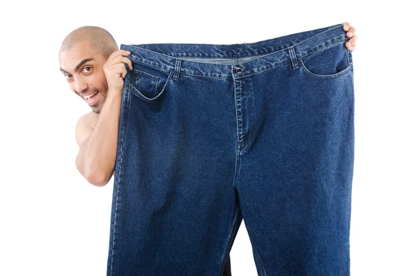 Uomo a dieta concetto con jeans oversize — Foto Stock