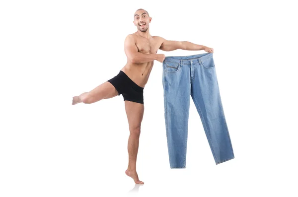 Man in het op dieet zijn concept met oversized jeans — Stockfoto