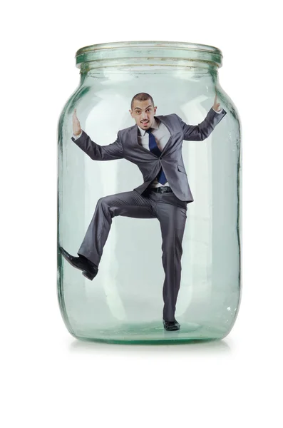 Young businessman in glass jar — Stock Photo, Image