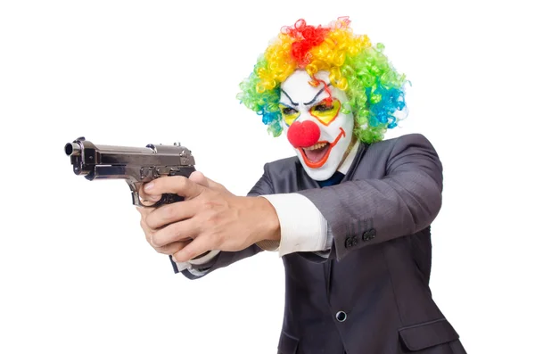 Клоун-бизнесмен с пистолетом, изолированный на белом — стоковое фото