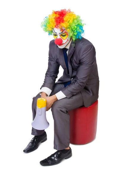 Zakenman clown met luidspreker op wit — Stockfoto