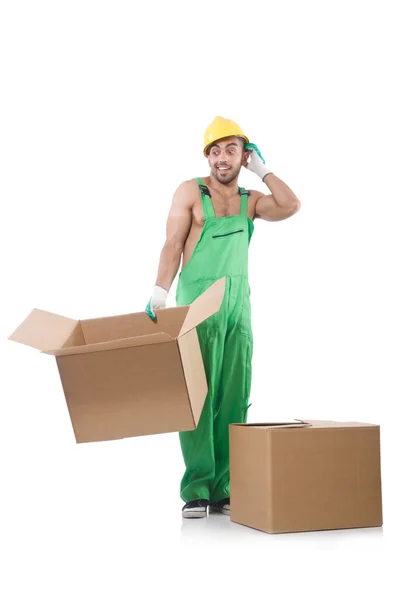 Man i grön overall med lådor — Stockfoto