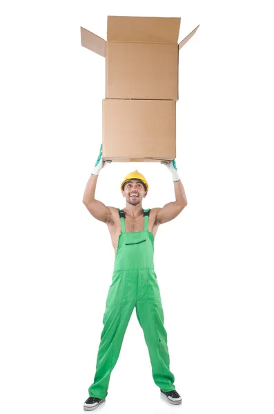 Hombre en mono verde con cajas — Foto de Stock