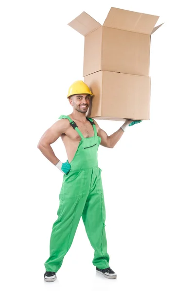 Hombre en mono verde con cajas — Foto de Stock