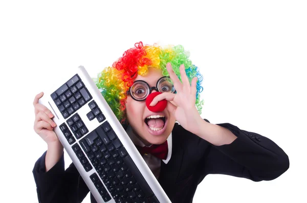 Funny clown with keyboard on white — Stock Photo, Image