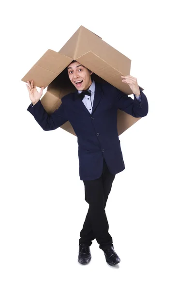 Бизнесмен с изолированной коробкой на белом — стоковое фото